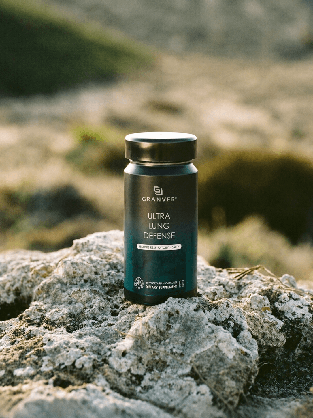Granver Ultra Lung Defense bottle in a natural landscape